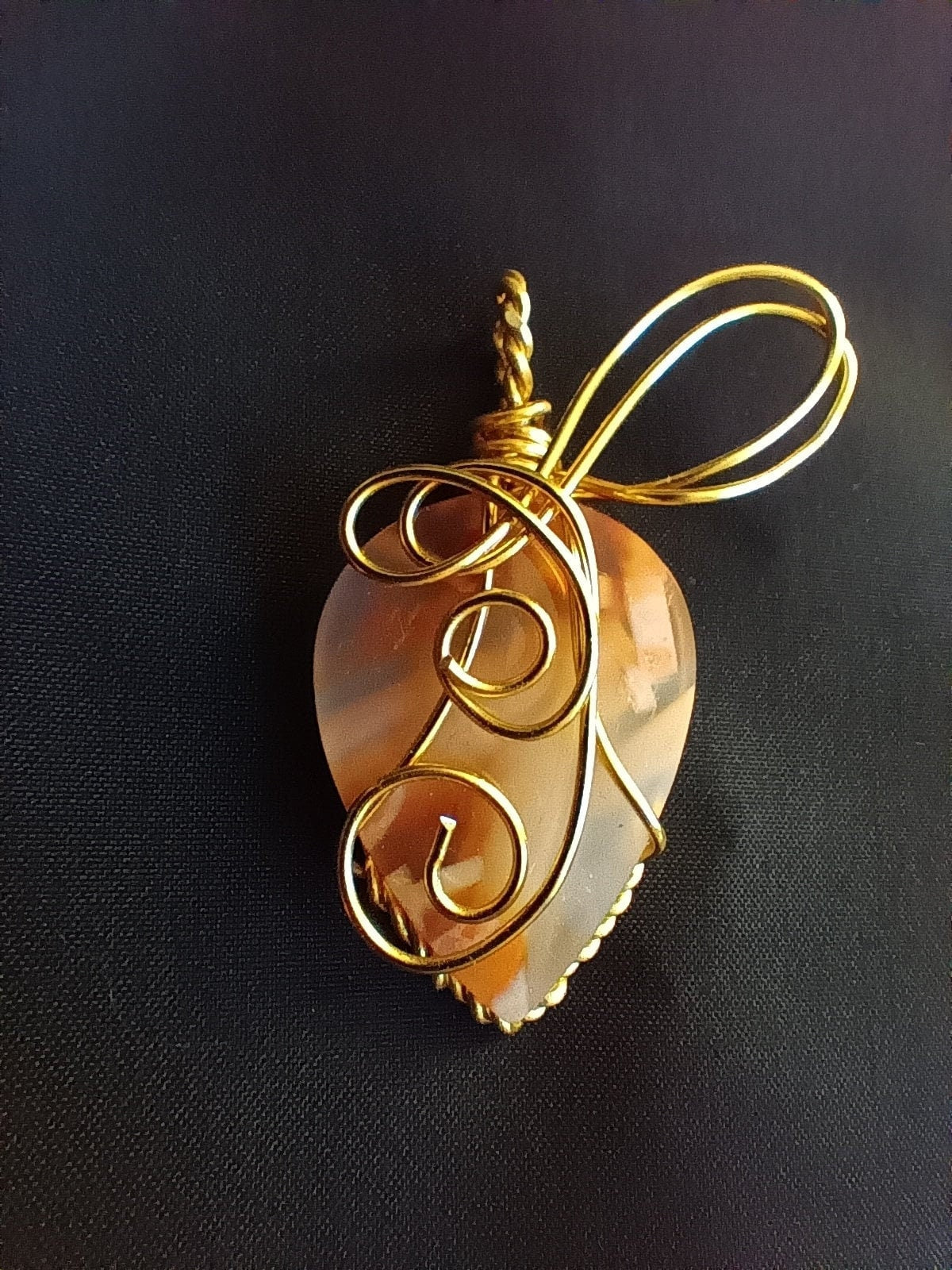 gold wrapped carnelian pendant