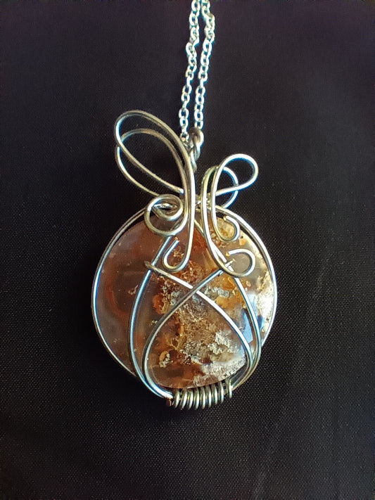 wire wrapped carnelian moss pendant